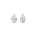 Pair of pear-shaped diamond stud earrings on a white background